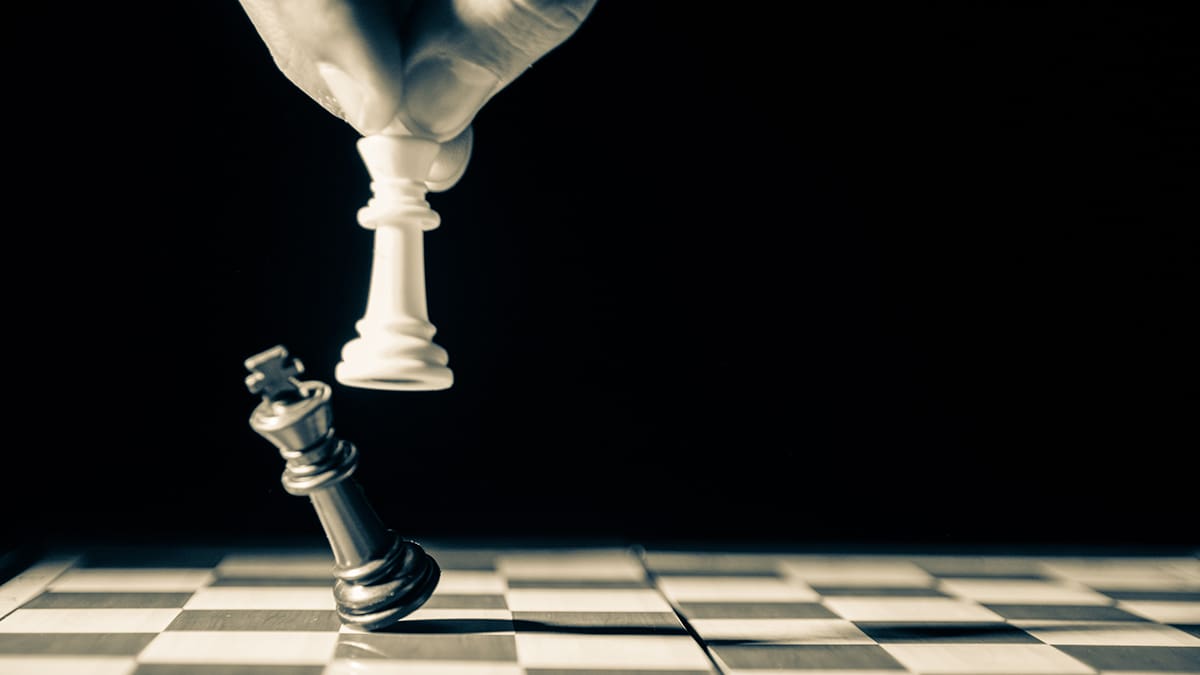A chess player scoring a checkmate.